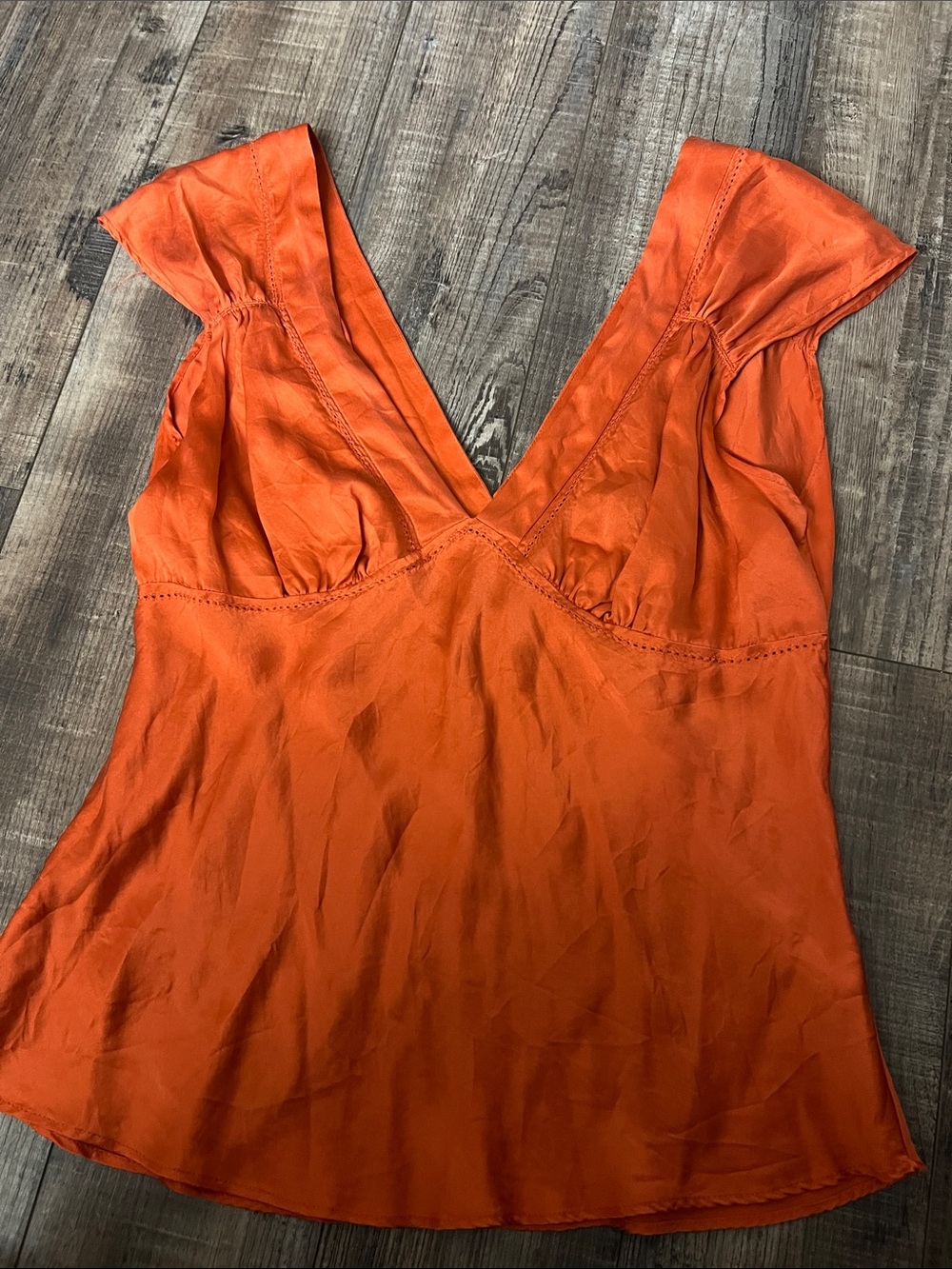 100% silk New York & Company Rust Orange Silk V-Neck Blouse